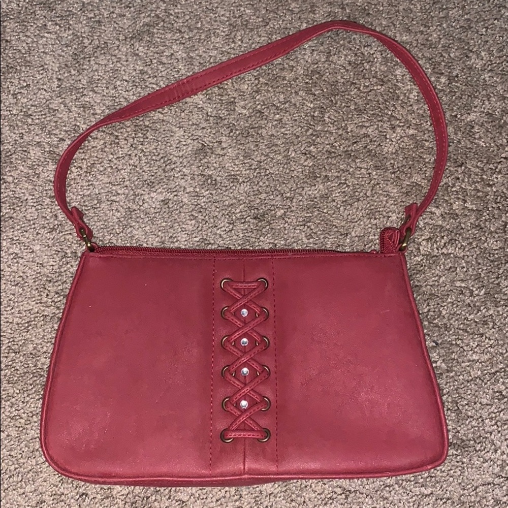 Dark red pocketbook with jewels